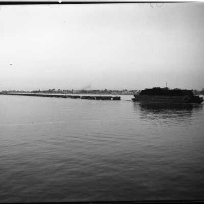 Dredger Being Towed out of Newport Harbor, 1936