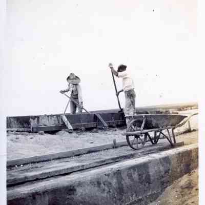 Two Men Building Seawall or Boardwalk on Balboa Island, July 1911