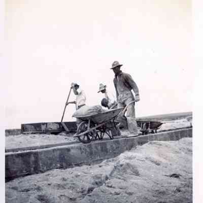 Three Men Building Seawall or Boardwalk on Balboa Island, July 1911
