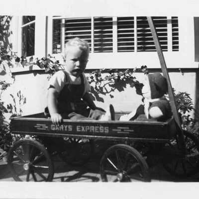 Gary Caldwell , 2 years old, in his wagon, 1945