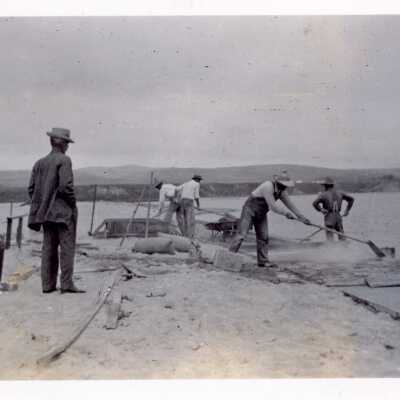 Men building Bay Front Walkway or Seawall