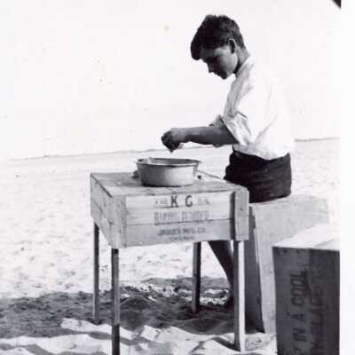 Young Man Shucking Clams on Balboa Island, July 1911