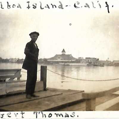 Albert Thomas Standing on a Dock Photo