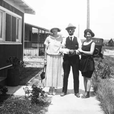 Alice Makosky, Herman Makosky, and Julia Proctor Standing in front of House on Balboa Island