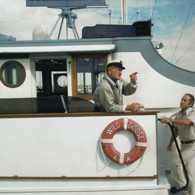 John Wayne makes his point clear to Bert Minshall