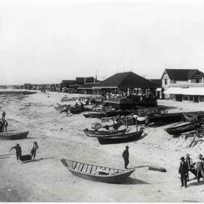 Newport Beach Showing Store Fronts and Dory Boats