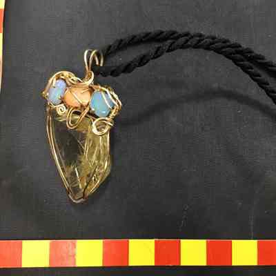 Retaliated Quartz Pendant