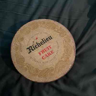 Metal Tin used to store a sewing kit