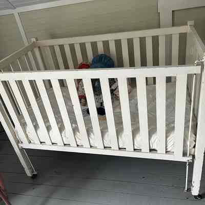 White Upstairs Crib: Another angle of the front of the white crib in the upstairs bedroom
