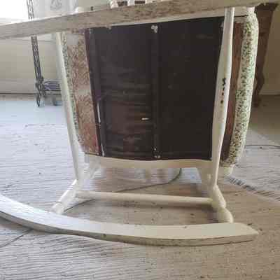 bottom view: The bottom view, where the unpainted wood is visible