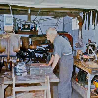 Oliver Collins in workshop garage