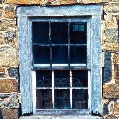Window by Feed Stone, with Bed Frame
