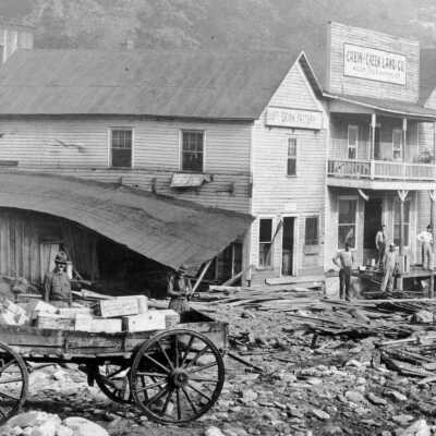 Decota, WV in immediate aftermath of the August 9, 1916 flood. Cabin Creek Land Company building can be seen, with the Soft Drink Factory in the building next door.: photo from collection of Kenny King
