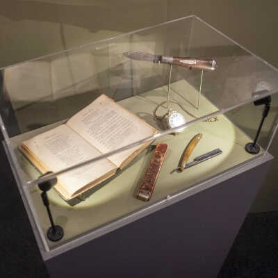 exhibition view of case with Frank Keeney's personal effects