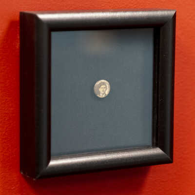 exhibition view, frame secured to wall
