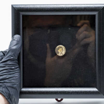 pin in shadowbox frame for exhibition