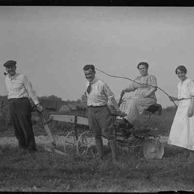 Group Posing with Plow