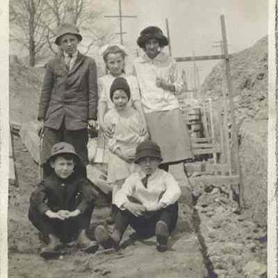 1915, "The Ditch," sewer on Lee Road. Six children are shown, but only five are identified: Marshall Dempcy, Priscilla Corlett, Agnes Litzel, Wallace J. Litzel, and John A. Corlett