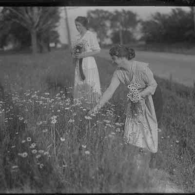 Two Women Picking Flowers