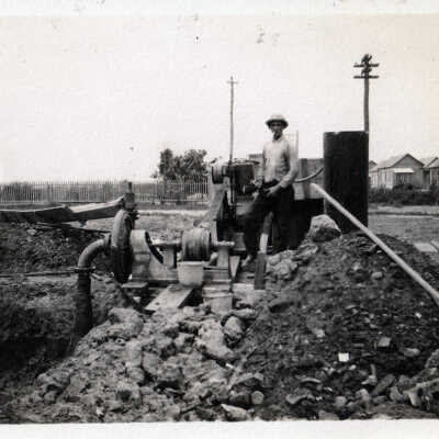 Unknown Man Working in a Ditch