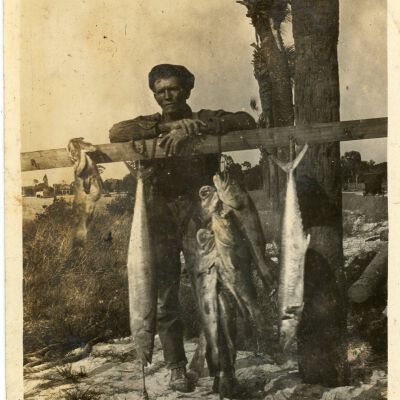 Man with Hanging Fish