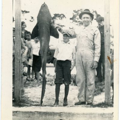Man and Boy with a Shark
