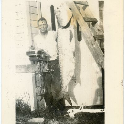 Man with Large Fish