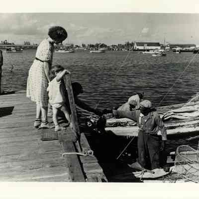 Woman and Child at a Fishing Dock