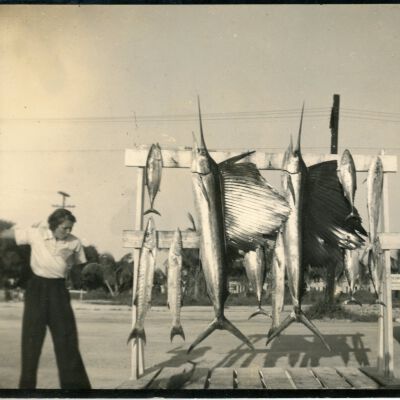 Man and Woman with Hanging Fish