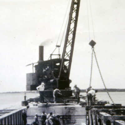 Locomotive Crane Constructing a Bridge