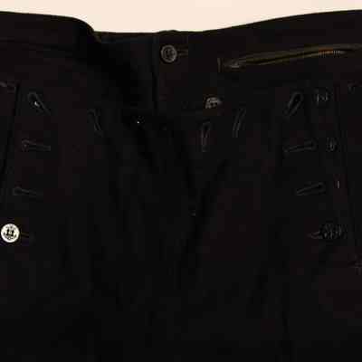U.S. Navy dress blue uniform pants, 13 button front flap: © Key West Art & Historical Society