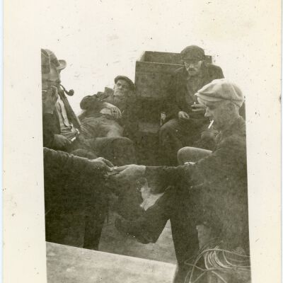 Men Smoking on a Boat