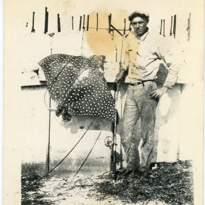 Man with Spotted Eagle Ray