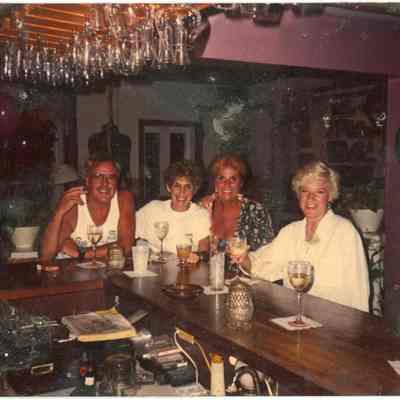 Nancy Loewy and Patrons Inside Pigeon House Patio Restaurant and Bar