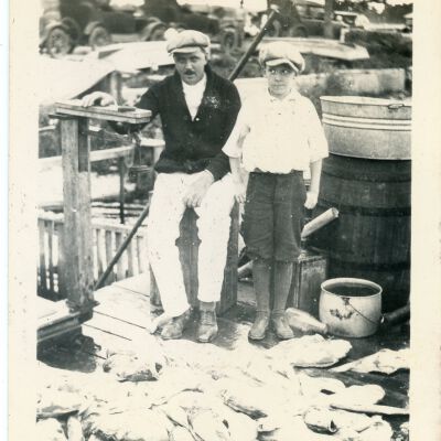 Man and Boy with Fish