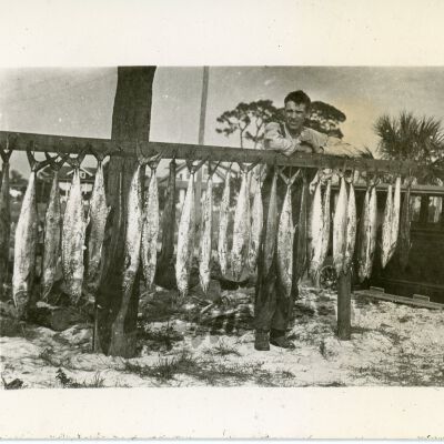 Man with Hanging Fish