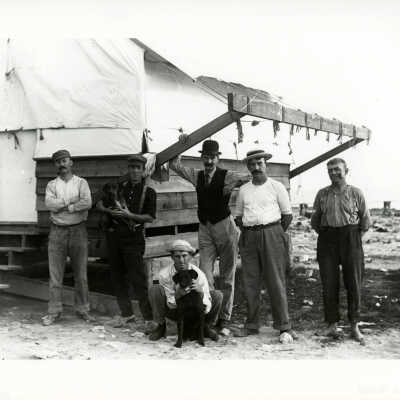 Workers in Front of Hospital Tent