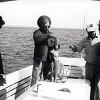 Fishermen Weighing Their Catch