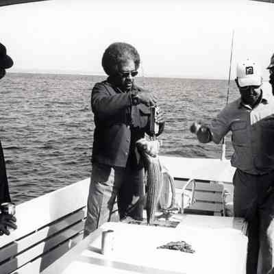 Fishermen Weighing Their Catch