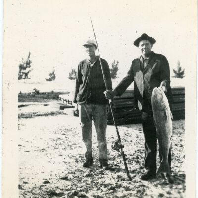 Two Unknown Men with Fish