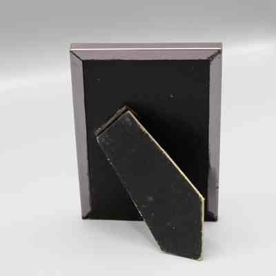 Framed name plaque for Nancy Loewy from the Doggie Bar at La Te Da: © Key West Art & Historical Society