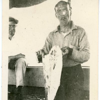 Two Unknown Men with a Mahi Mahi