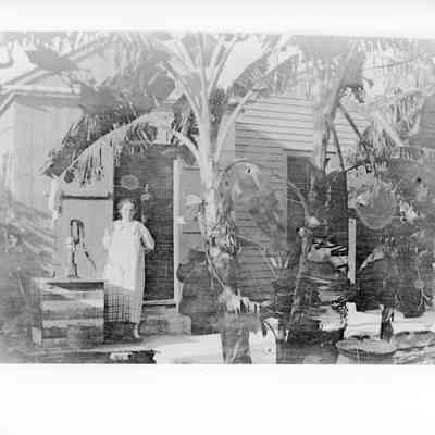 Woman Standing on Porch