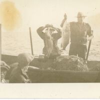 Four Men with Fish