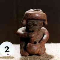 Hollow Seated Figure