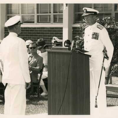 U.S. Military men standing by a podium