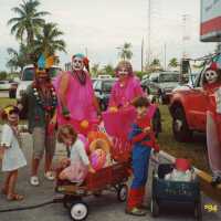 A group of unknown people dressed up.