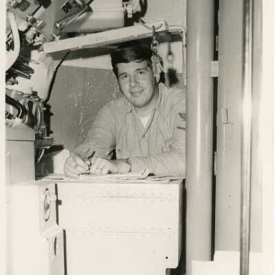 U.S. Navy man working on a ship
