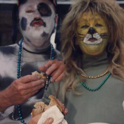 Unknown people dressed up.