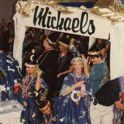 A float in the parade that reads Michaels.